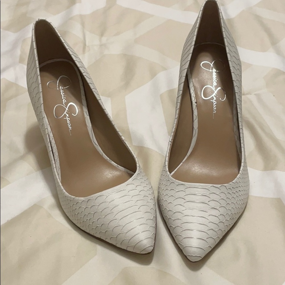 High heeled pointy toe pumps